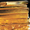 Cae precio del oro